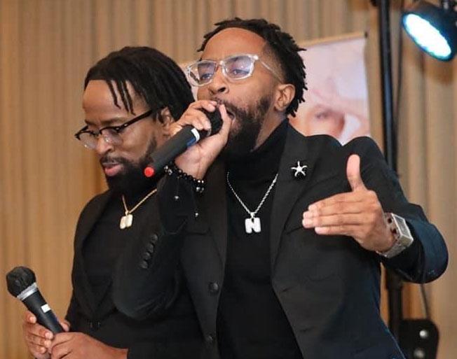 Person holding the mike and giving the speech